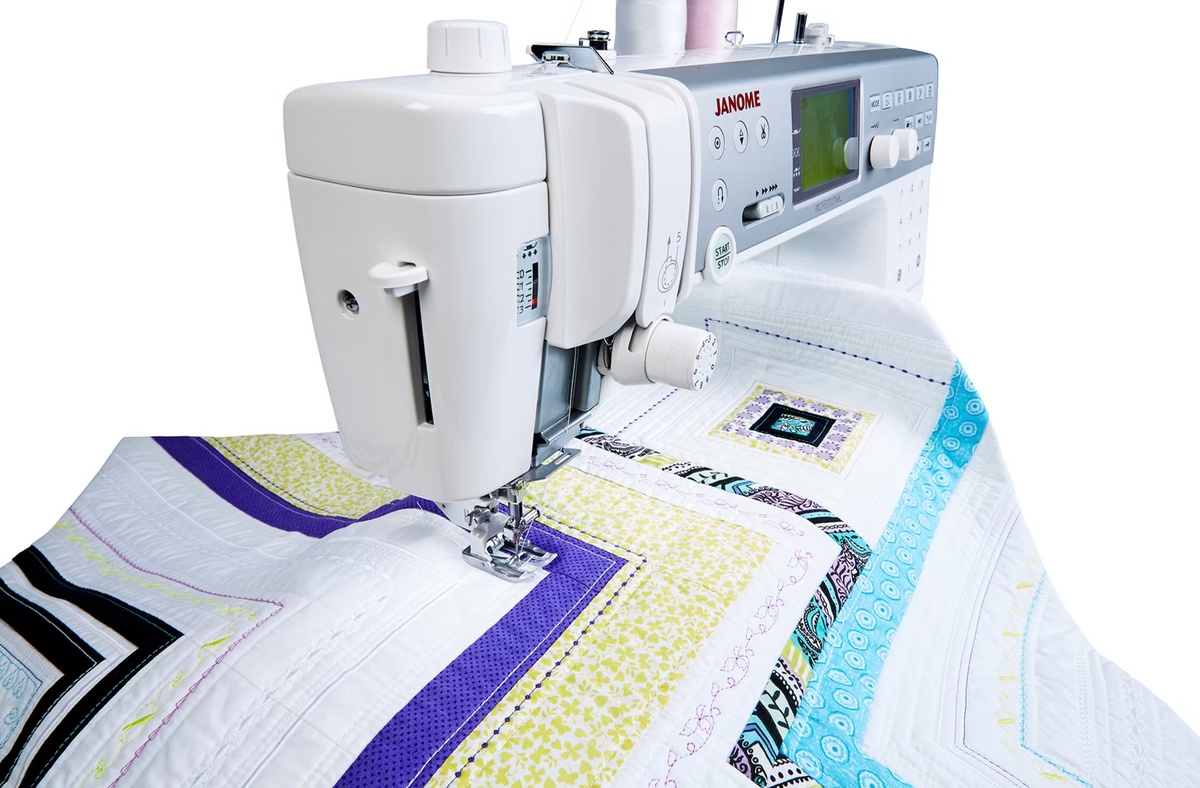 Janome Memory Craft 6700P High-Speed Flatbed Sewing Machine